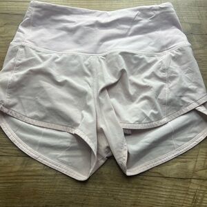 Lululemon light pink running shorts built-in liner zip pocket